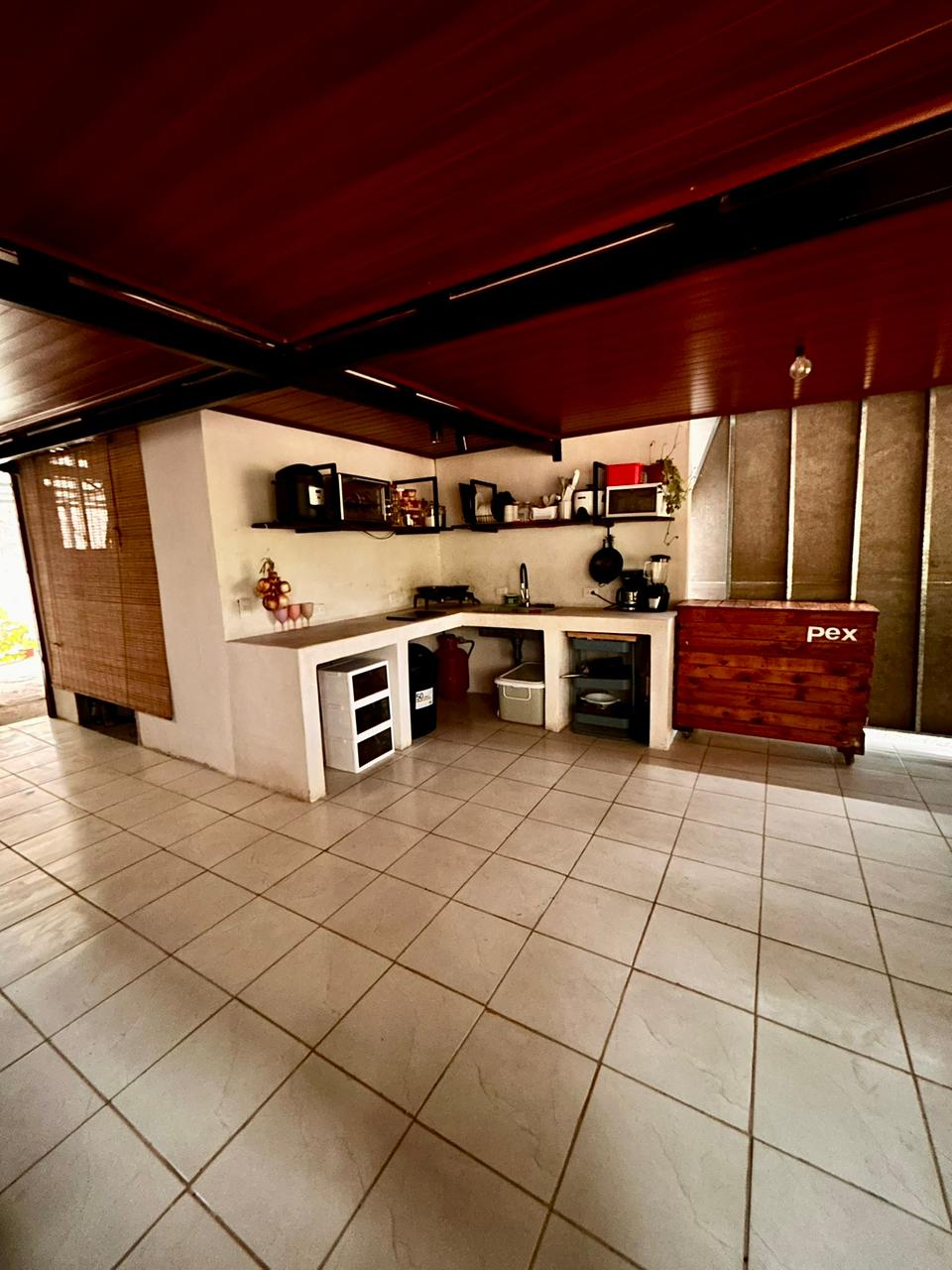 Shared kitchen with full appliances and dining space