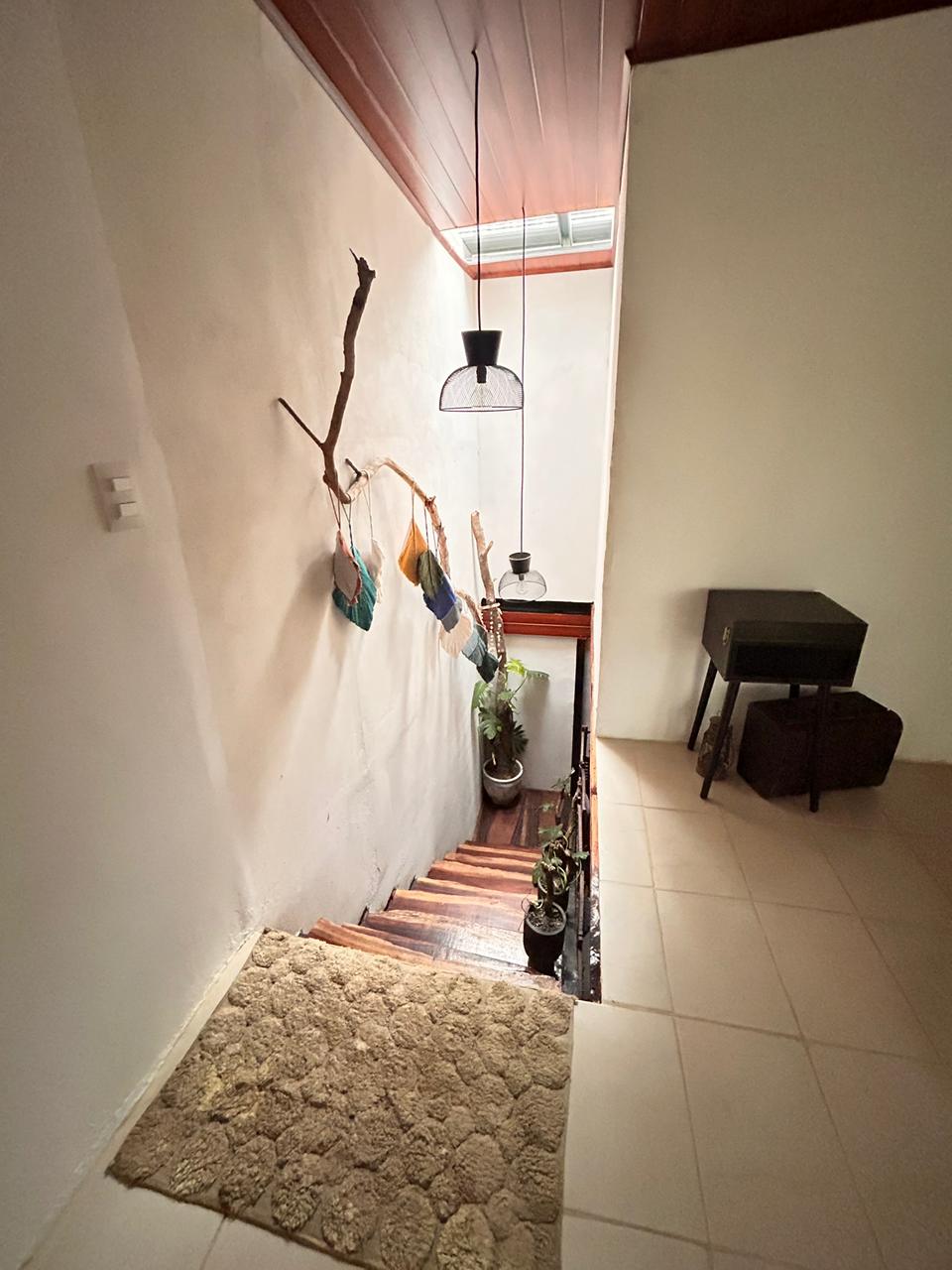 Indoor staircase with rustic wooden steps and decor