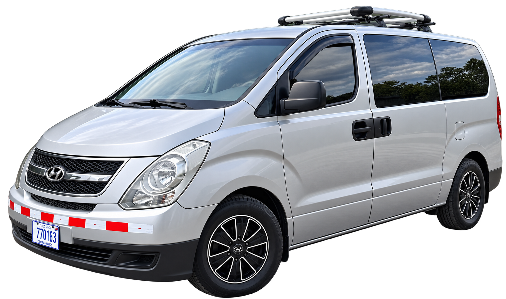 Hyundai H-1 silver minibus for private transfers and tours with driver — Chango's Lodge & Adventures